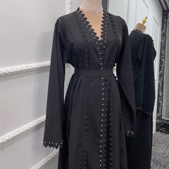 Cardigan perlé fait main, jupe longue élégante