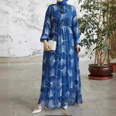 Abaya – a custom Muslim dress, leaf print, loose fit, long sleeves, suitable for Dubai parties, made of pleated chiffon.