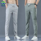 2025 Pantalon pour hommes printemps été nouveau mince vert couleur unie mode poche Applique pleine longueur Pantalon de travail décontracté Pantalon