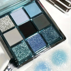 Mesmerizing Blue Sky 9-Color Eyeshadow Palette - Shimmer, Glitter & Matte Finishes - Waterproof, Sweatproof, Long-Lasting - Perfect for Smoky Grey & Blue Makeup Looks