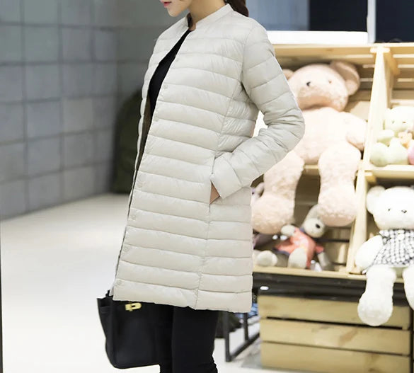 Femme printemps rembourré manteau chaud Ultra léger canard doudoune longue femme pardessus mince solide vestes hiver manteau Portable Parkas