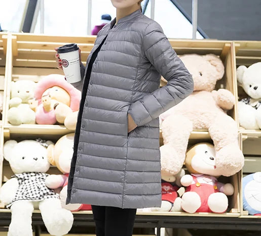 Femme printemps rembourré manteau chaud Ultra léger canard doudoune longue femme pardessus mince solide vestes hiver manteau Portable Parkas