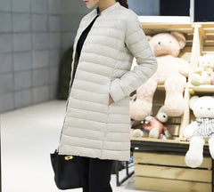 Femme printemps rembourré manteau chaud Ultra léger canard doudoune longue femme pardessus mince solide vestes hiver manteau Portable Parkas