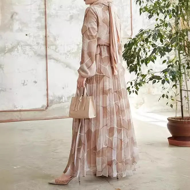 Abaya – a custom Muslim dress, leaf print, loose fit, long sleeves, suitable for Dubai parties, made of pleated chiffon.