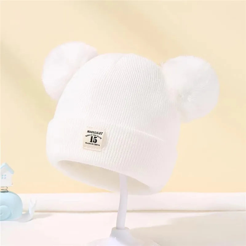 Bonnet en tricot avec pompon pour enfants chapeaux chauds pour bébés chapeau pour enfants accessoires pour garçons et filles document solide automne et hiver