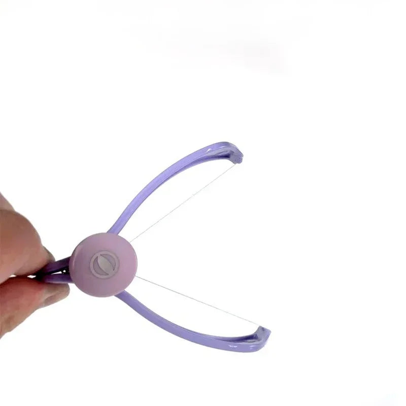 Portable purple facial hair remover with facial thread for beauty purposes