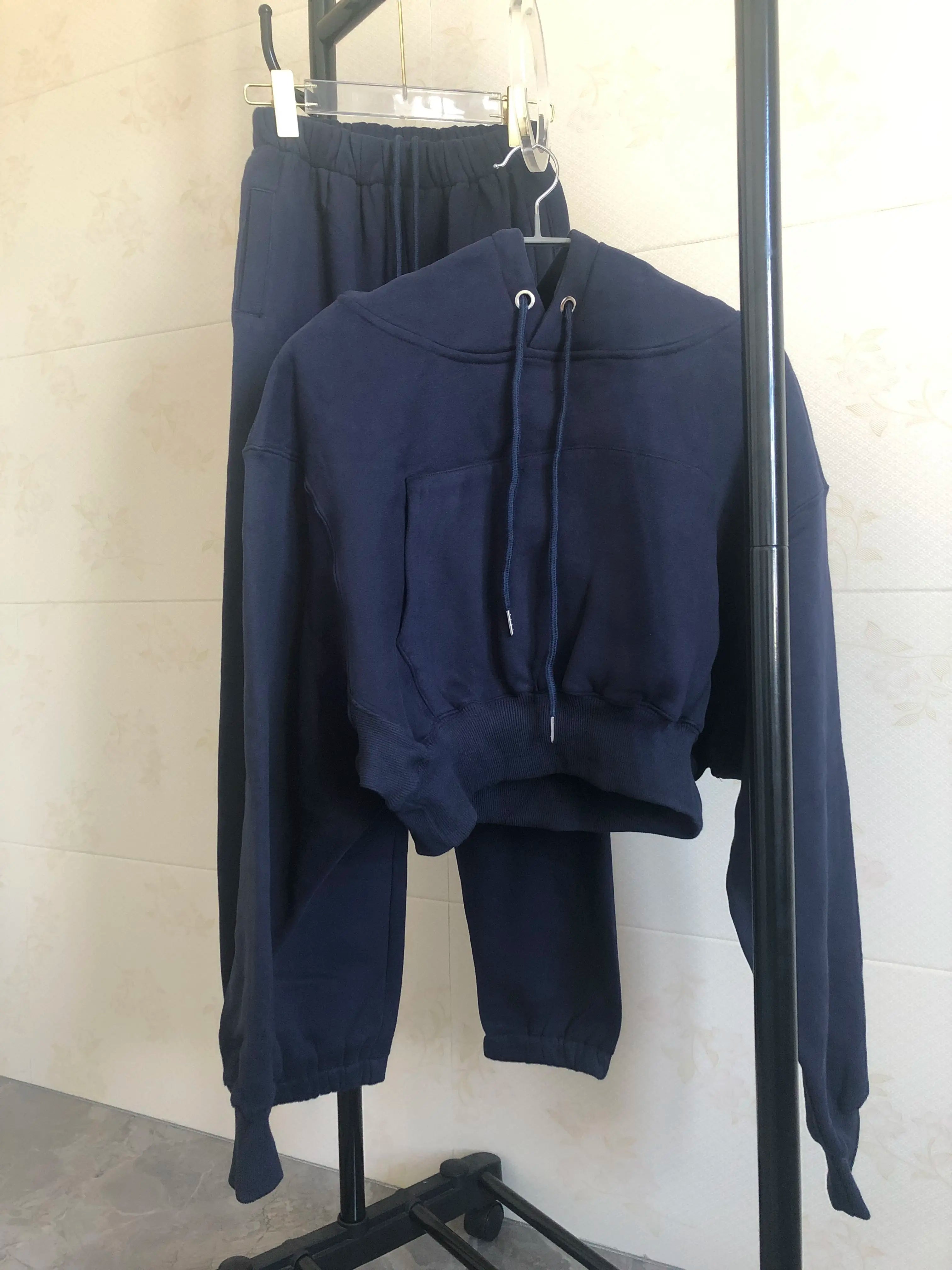 Sweat à capuche Smile avec pantalon de jogging pour femme, ensemble 2 pièces, tenue de sport décontractée, survêtement monochrome, imbibé de sueur, vente en gros, automne et hiver