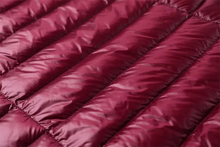 Femme printemps rembourré à capuche longue veste blanc canard vers le bas femme pardessus Ultra léger mince solide vestes manteau Portable Parkas