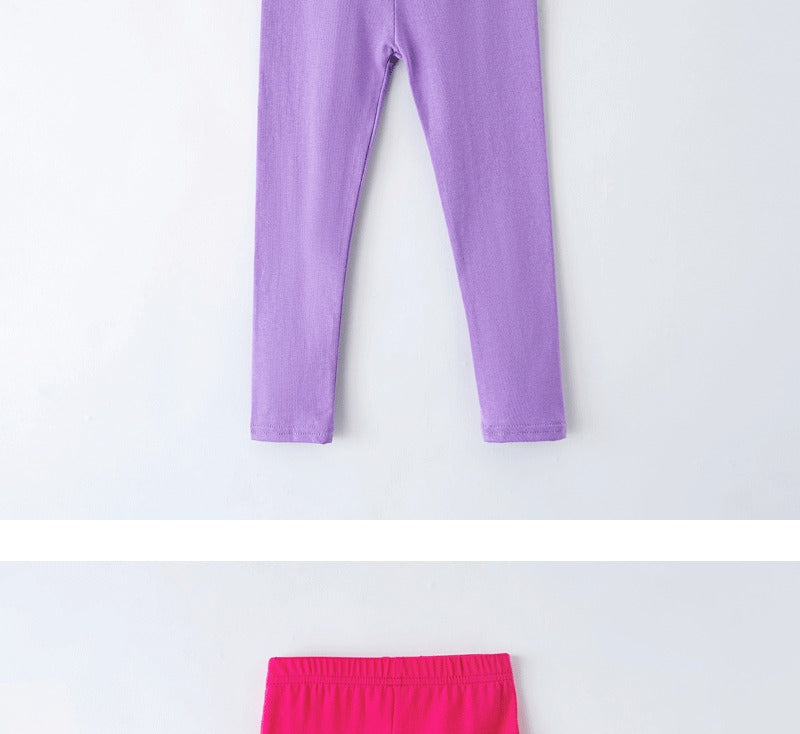 Girls' leggings for spring and summer, suitable for outdoor wear. They are slim-fitting, long pants for children.
