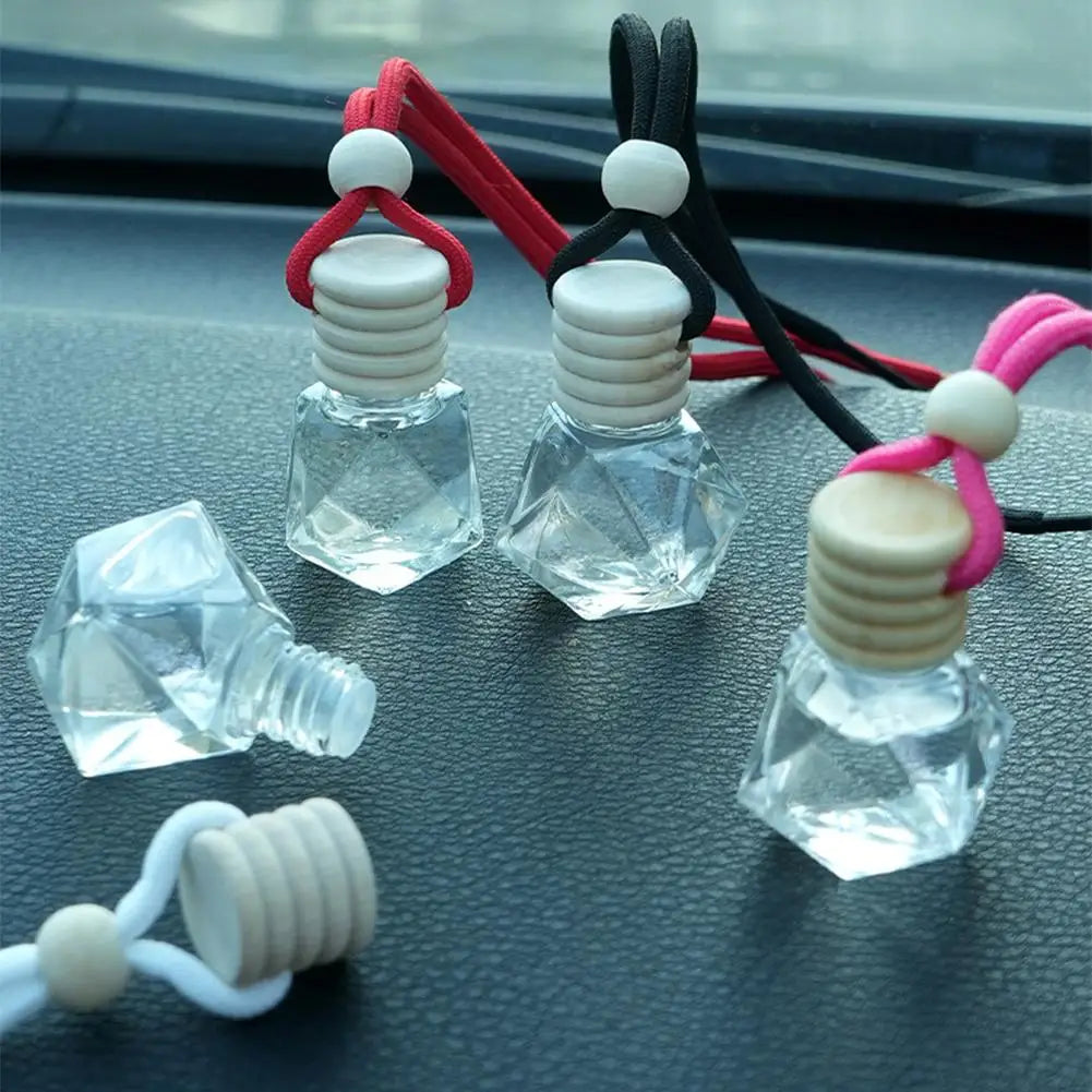 Diffuseur d'aromathérapie pour voiture, bouteille en verre suspendue, désodorisant automatique pour huiles essentielles, décor d'ornement de parfum de voiture naturel