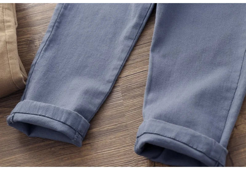 Boys' cartoon embroidered jeans, versatile short-legged haren pants, casual trousers, stylish children's trousers, new summer collection