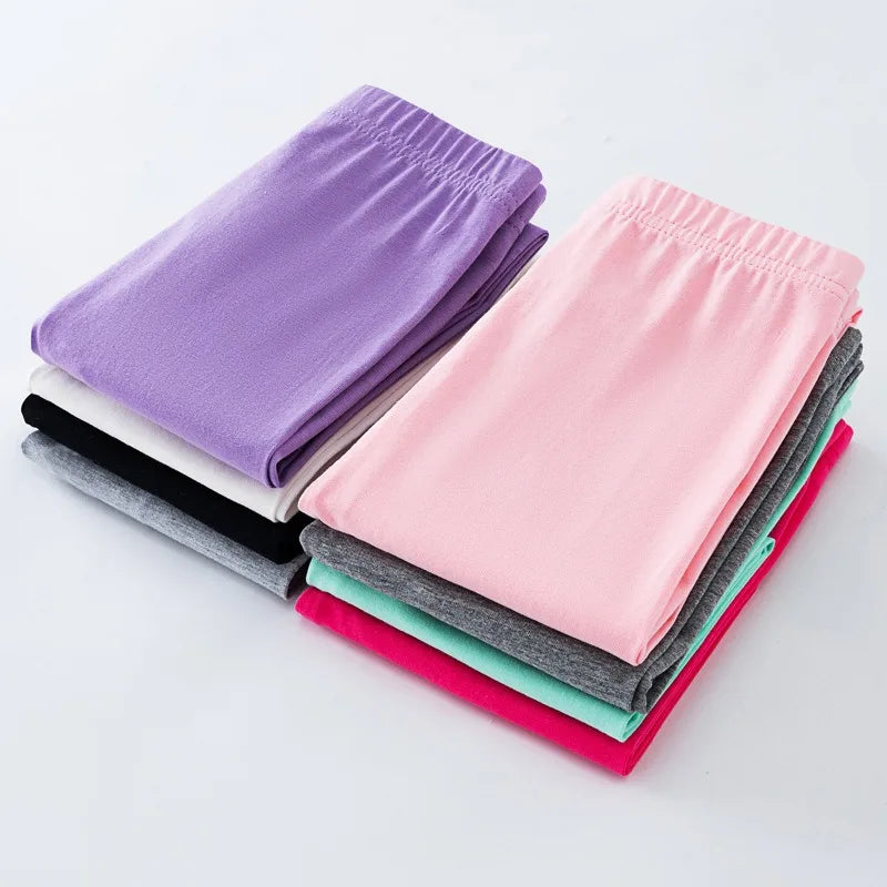 Girls' leggings for spring and summer, suitable for outdoor wear. They are slim-fitting, long pants for children.