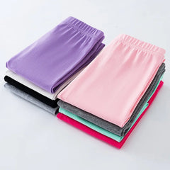 Girls' leggings for spring and summer, suitable for outdoor wear. They are slim-fitting, long pants for children.