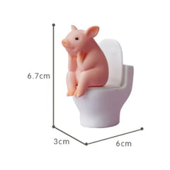 Cartoon pig desk ornament, pig sitting on the toilet, miniature pig figurine, creative toy, children's gift, desk decoration