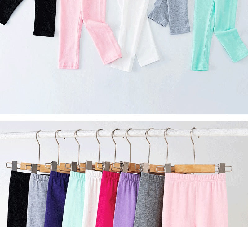 Girls' leggings for spring and summer, suitable for outdoor wear. They are slim-fitting, long pants for children.