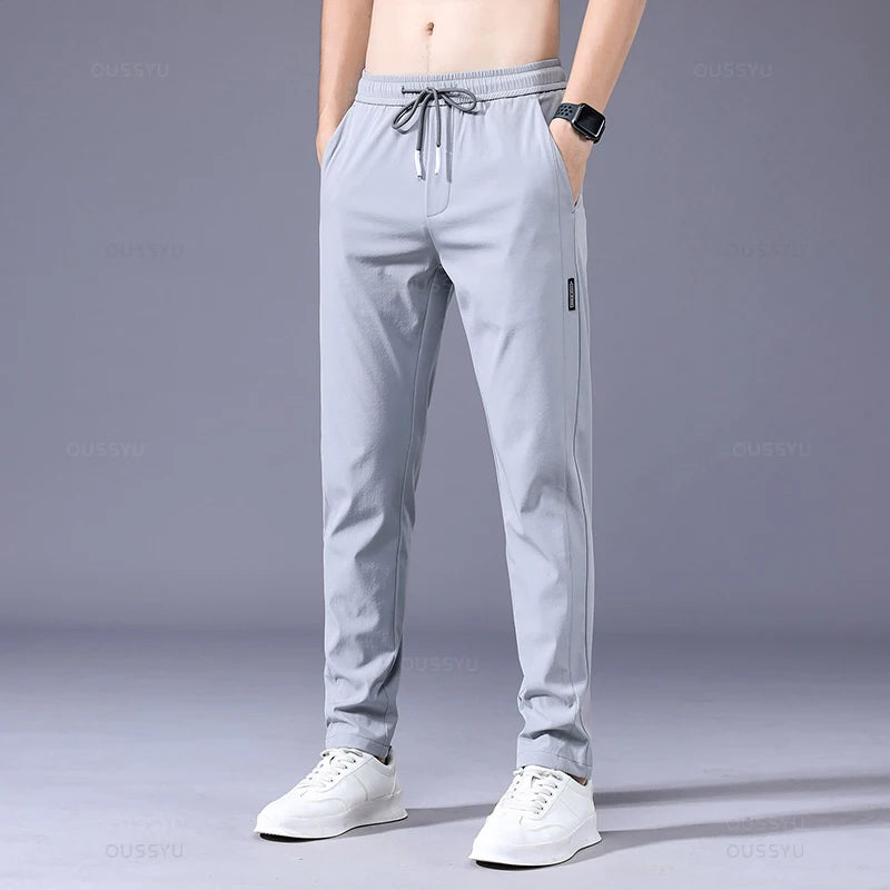 2025 Pantalon pour hommes printemps été nouveau mince vert couleur unie mode poche Applique pleine longueur Pantalon de travail décontracté Pantalon