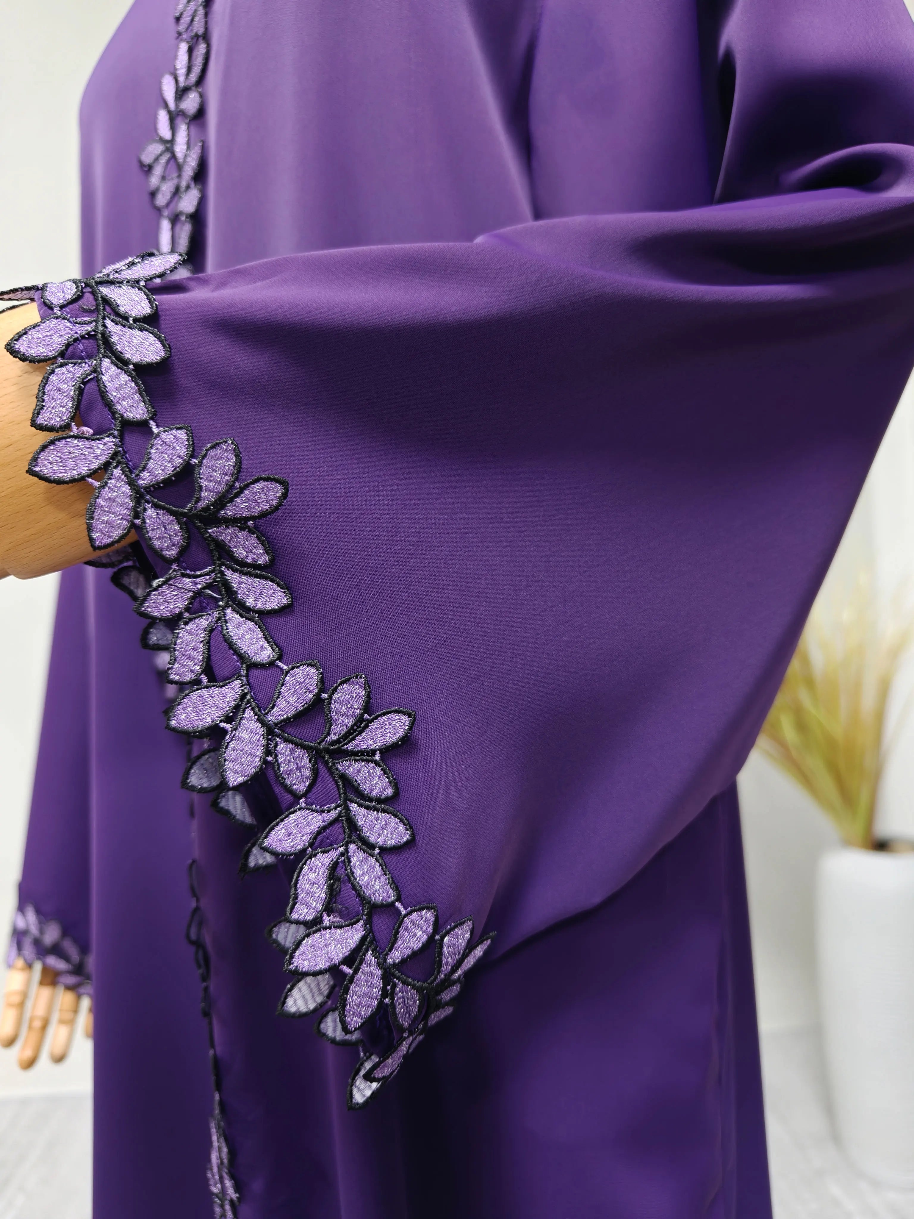 Elegant beige abaya from Dubai for Muslim women – Designed with a piece of multicolored embroidery in modest Islamic fashion