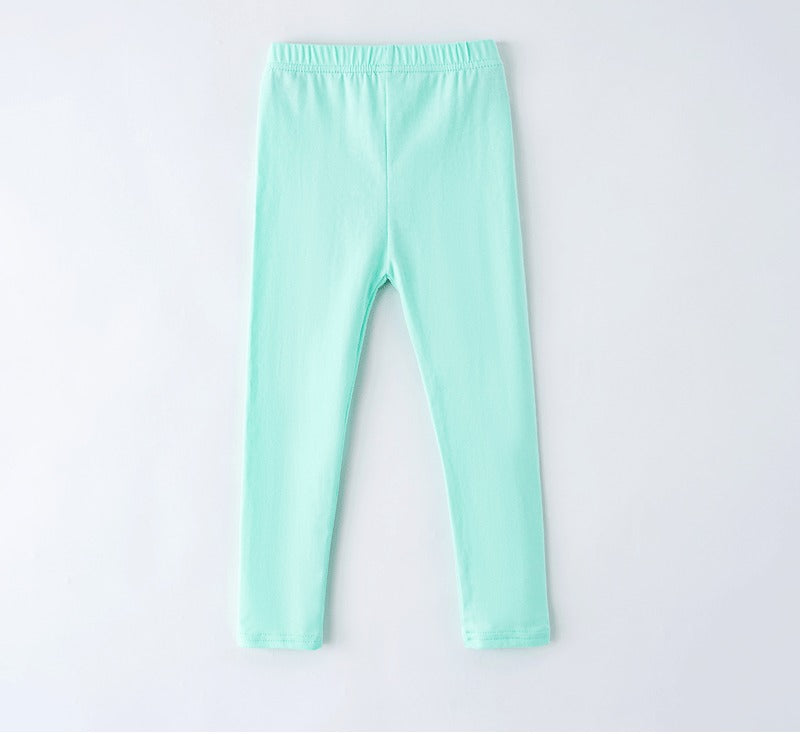Girls' leggings for spring and summer, suitable for outdoor wear. They are slim-fitting, long pants for children.
