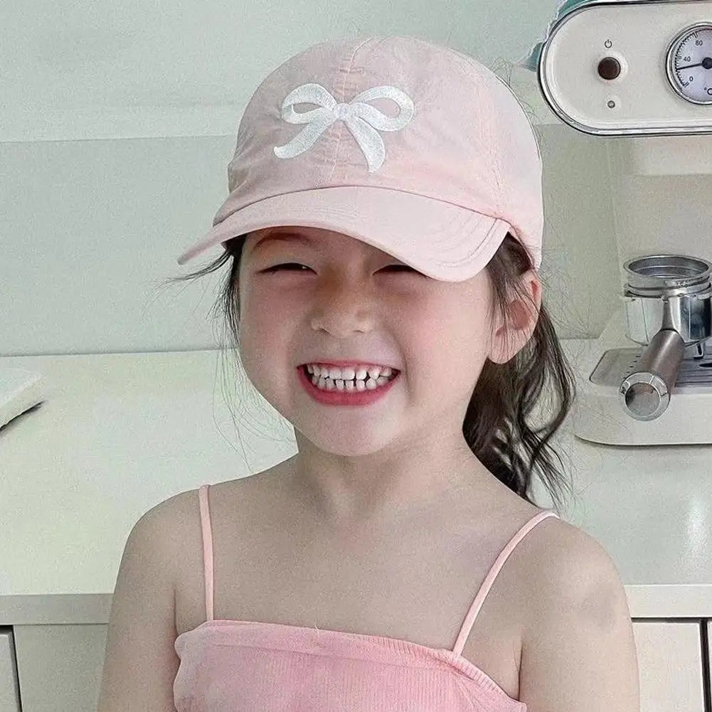 Visière de chapeau de baseball pour enfants mignons, casquette de soleil à nœud papillon imperméable, chapeau à queue de cheval haut pour petites filles, chapeau de plage d'été réglable de 2 à 5 ans