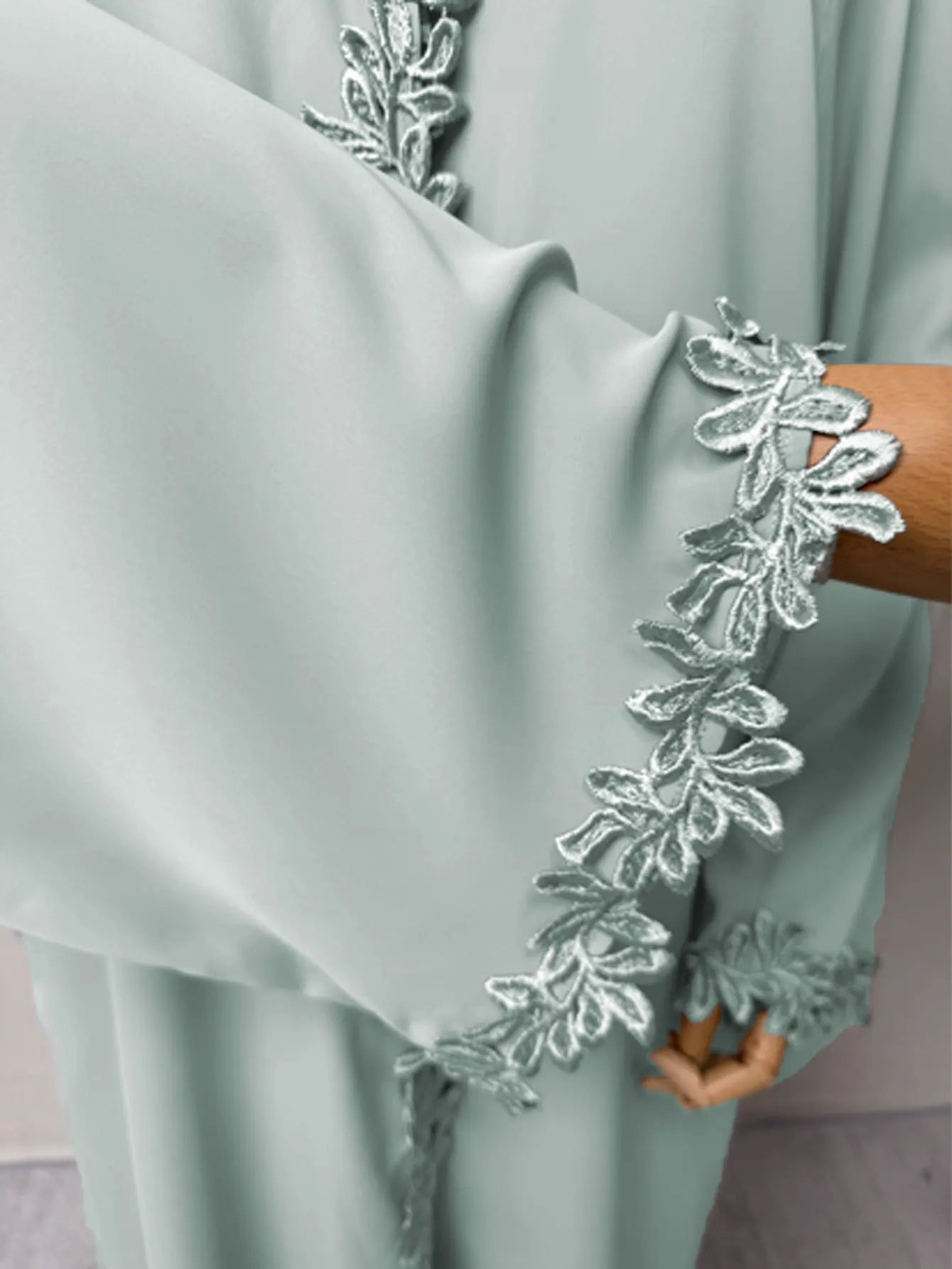 Elegant beige abaya from Dubai for Muslim women – Designed with a piece of multicolored embroidery in modest Islamic fashion