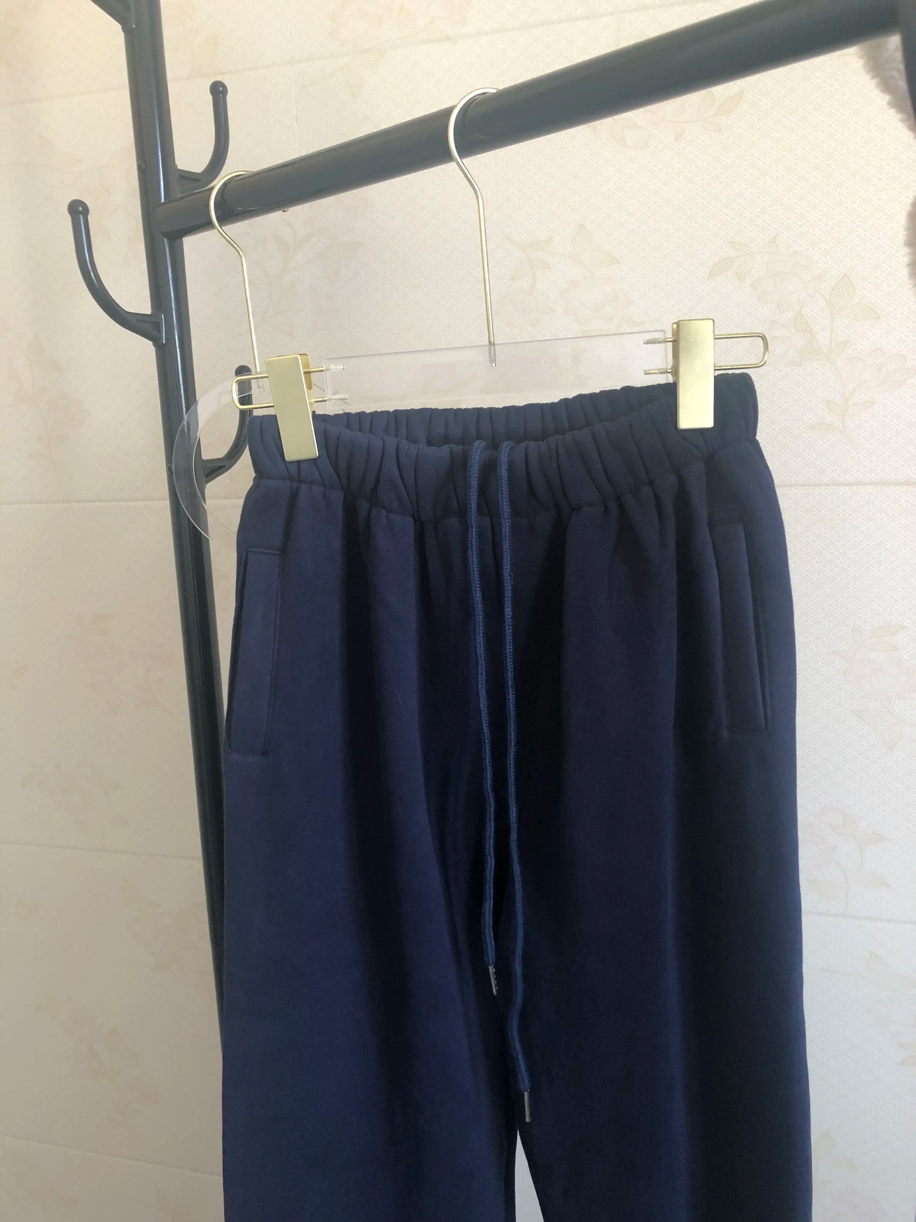 Sweat à capuche Smile avec pantalon de jogging pour femme, ensemble 2 pièces, tenue de sport décontractée, survêtement monochrome, imbibé de sueur, vente en gros, automne et hiver