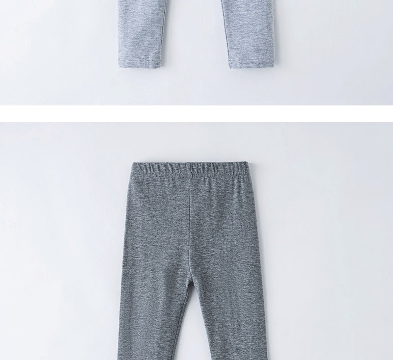 Girls' leggings for spring and summer, suitable for outdoor wear. They are slim-fitting, long pants for children.