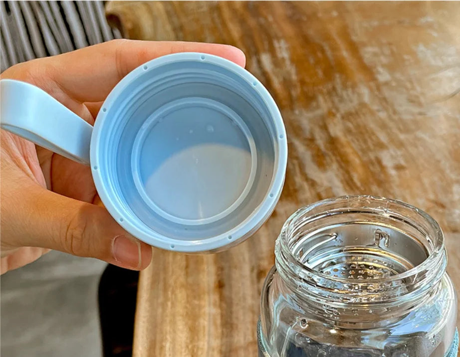 Bouteille en verre Portable de 340ML et 480ML, mignonne, résistante à la chaleur, pour boire de l'eau froide, du jus de thé, avec couvercle à vis, filet filtrant facile à transporter