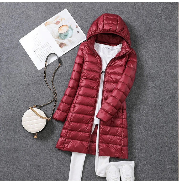 Femme printemps rembourré à capuche longue veste blanc canard vers le bas femme pardessus Ultra léger mince solide vestes manteau Portable Parkas