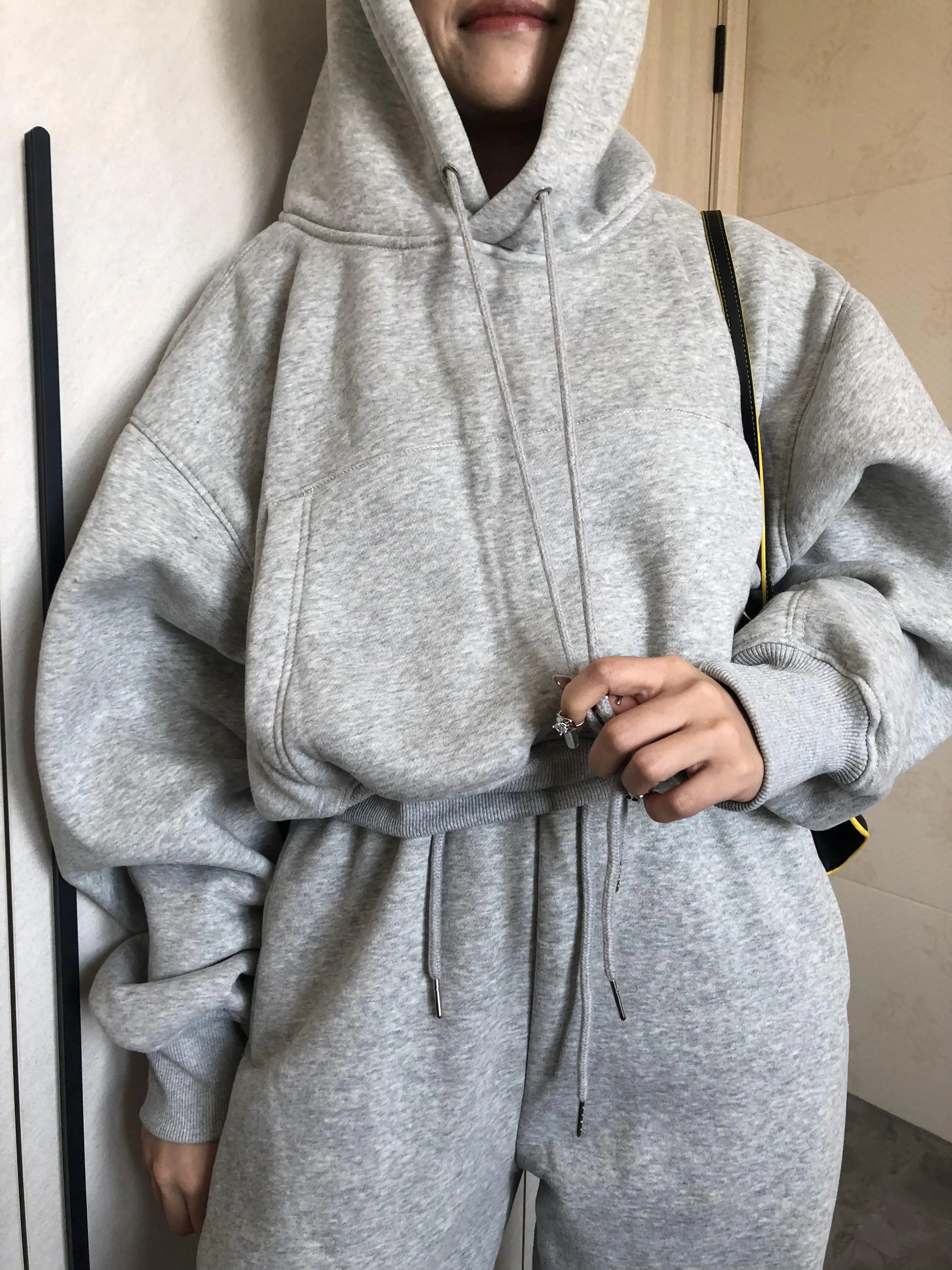 Sweat à capuche Smile avec pantalon de jogging pour femme, ensemble 2 pièces, tenue de sport décontractée, survêtement monochrome, imbibé de sueur, vente en gros, automne et hiver