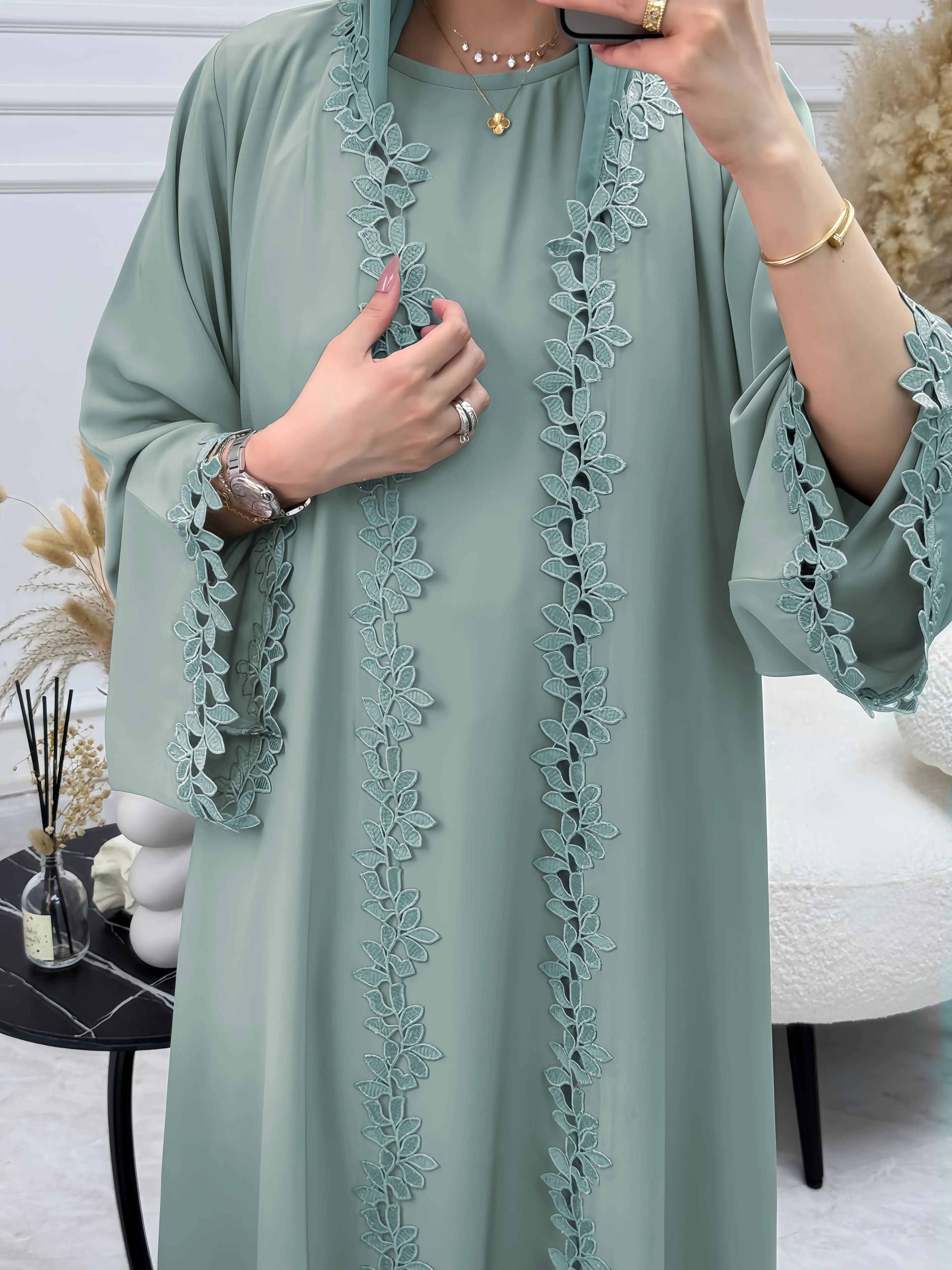 Elegant beige abaya from Dubai for Muslim women – Designed with a piece of multicolored embroidery in modest Islamic fashion