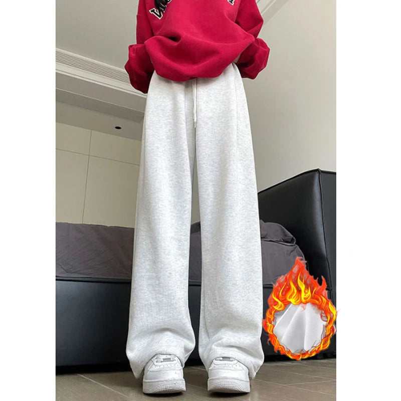Women's basic elasticated track pants, available in white, grey, and black, with wide legs, straight leg, versatile fit, and high waist.