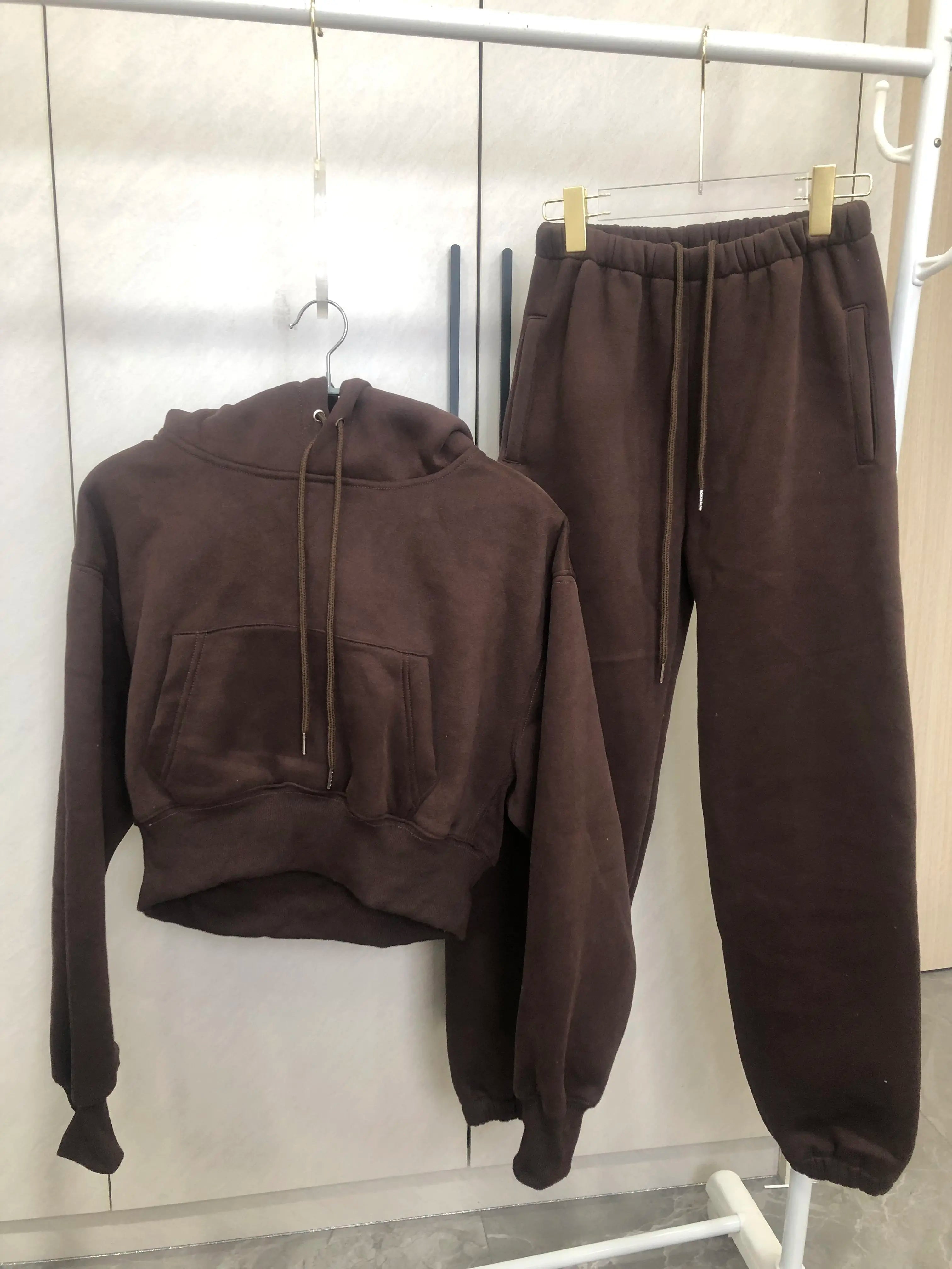 Sweat à capuche Smile avec pantalon de jogging pour femme, ensemble 2 pièces, tenue de sport décontractée, survêtement monochrome, imbibé de sueur, vente en gros, automne et hiver