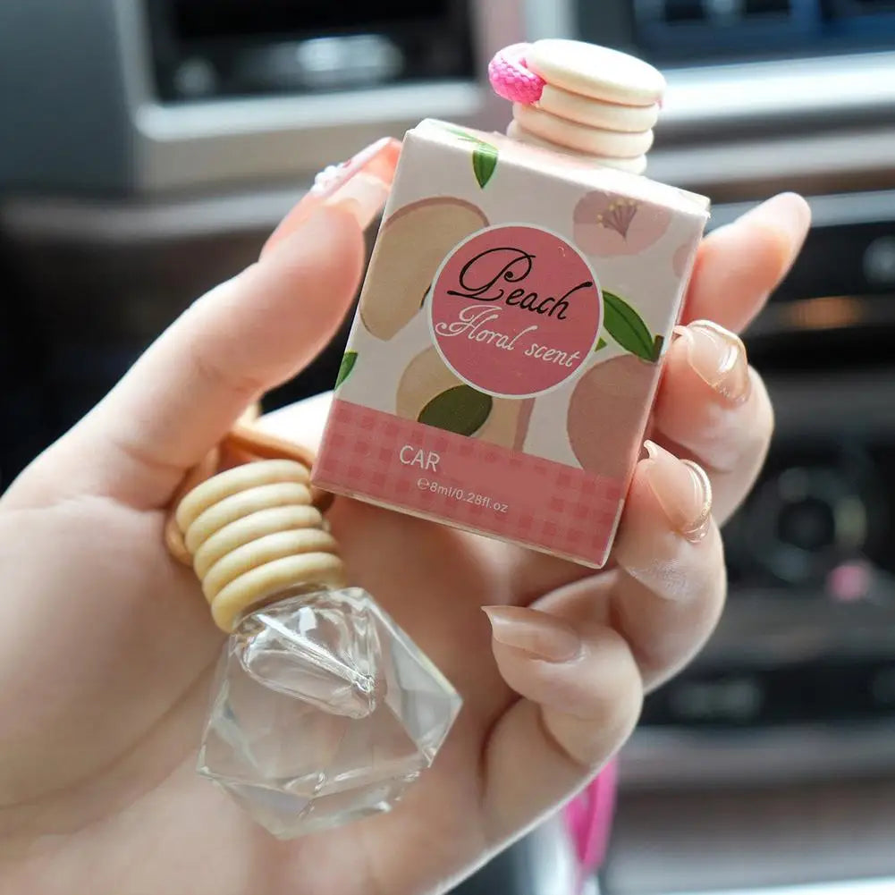 Diffuseur d'aromathérapie pour voiture, bouteille en verre suspendue, désodorisant automatique pour huiles essentielles, décor d'ornement de parfum de voiture naturel