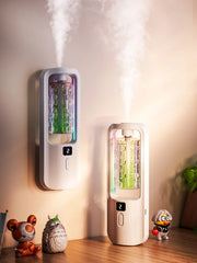 Diffuseur d'aromathérapie automatique pour éliminer les odeurs, adapté à un usage domestique, avec de l'huile essentielle pour le rafraîchissement de l'air.