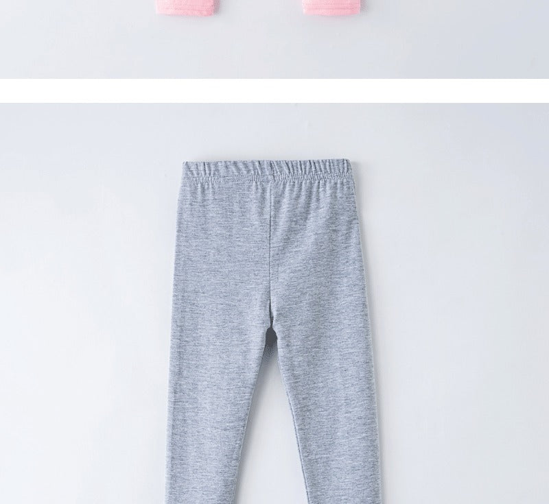 Girls' leggings for spring and summer, suitable for outdoor wear. They are slim-fitting, long pants for children.