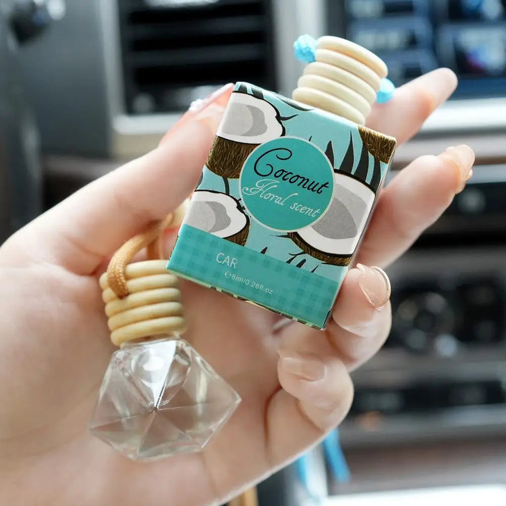 Diffuseur d'aromathérapie pour voiture, bouteille en verre suspendue, désodorisant automatique pour huiles essentielles, décor d'ornement de parfum de voiture naturel