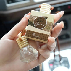 Diffuseur d'aromathérapie pour voiture, bouteille en verre suspendue, désodorisant automatique pour huiles essentielles, décor d'ornement de parfum de voiture naturel