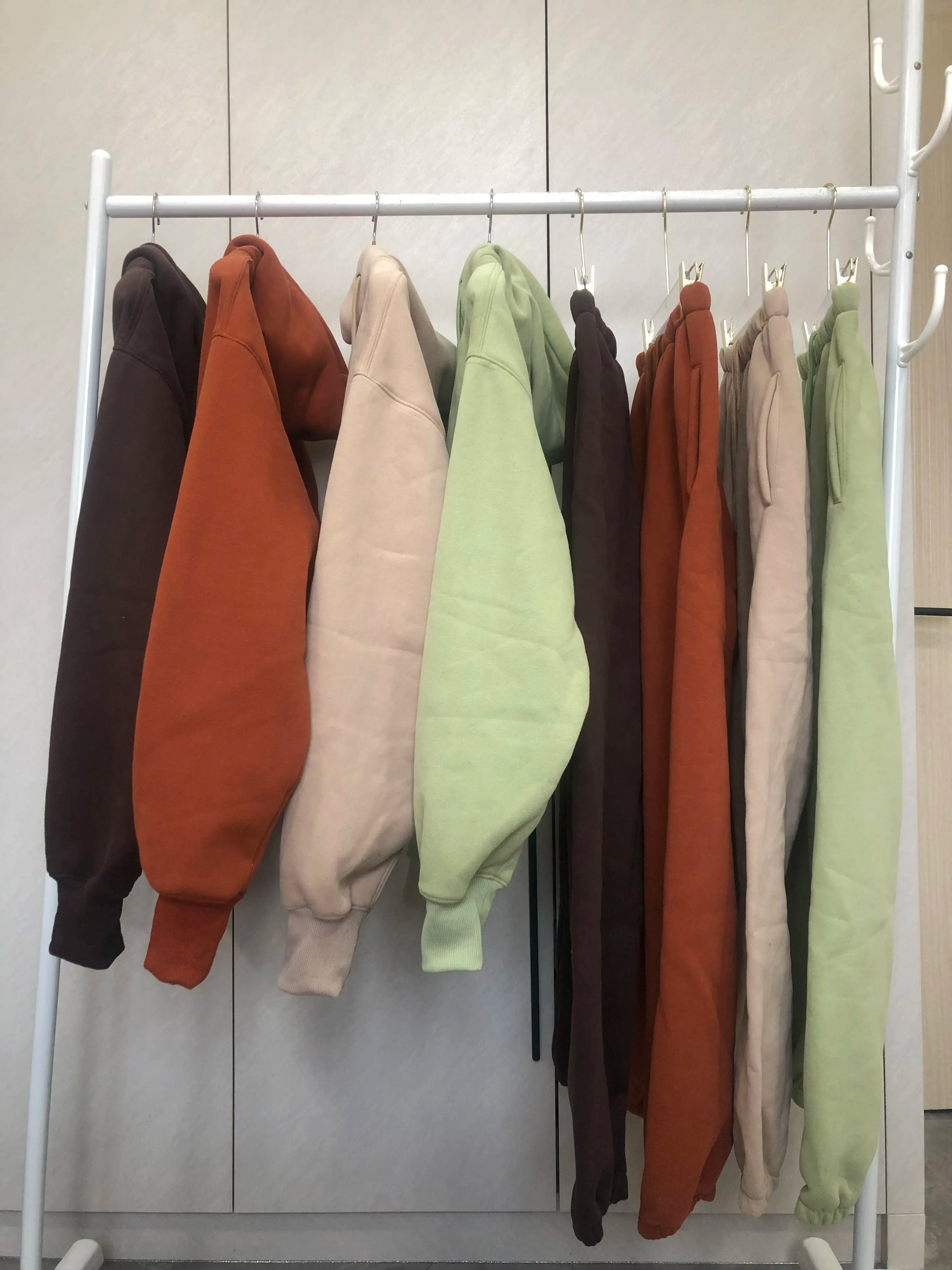 Sweat à capuche Smile avec pantalon de jogging pour femme, ensemble 2 pièces, tenue de sport décontractée, survêtement monochrome, imbibé de sueur, vente en gros, automne et hiver