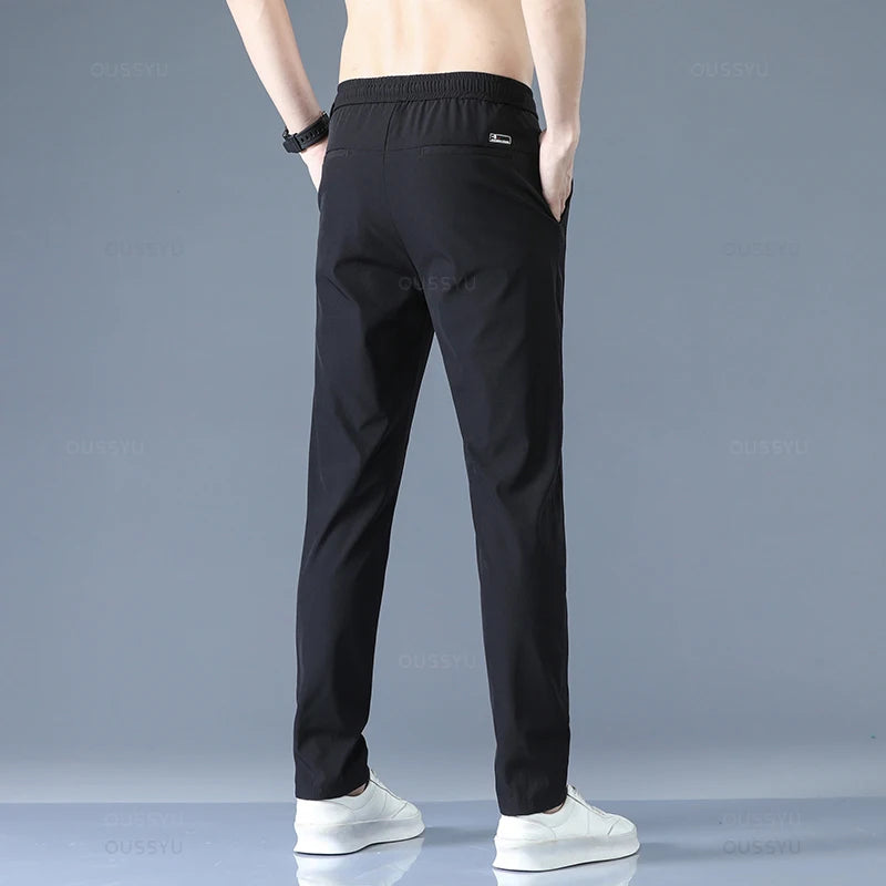 2025 Pantalon pour hommes printemps été nouveau mince vert couleur unie mode poche Applique pleine longueur Pantalon de travail décontracté Pantalon