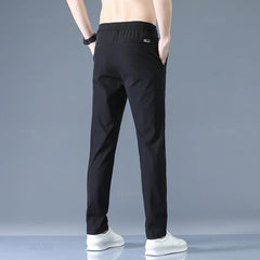 2025 Pantalon pour hommes printemps été nouveau mince vert couleur unie mode poche Applique pleine longueur Pantalon de travail décontracté Pantalon