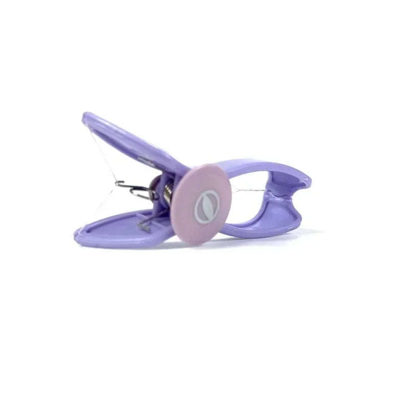 Portable purple facial hair remover with facial thread for beauty purposes
