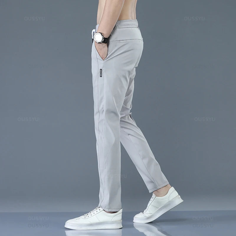 2025 Pantalon pour hommes printemps été nouveau mince vert couleur unie mode poche Applique pleine longueur Pantalon de travail décontracté Pantalon