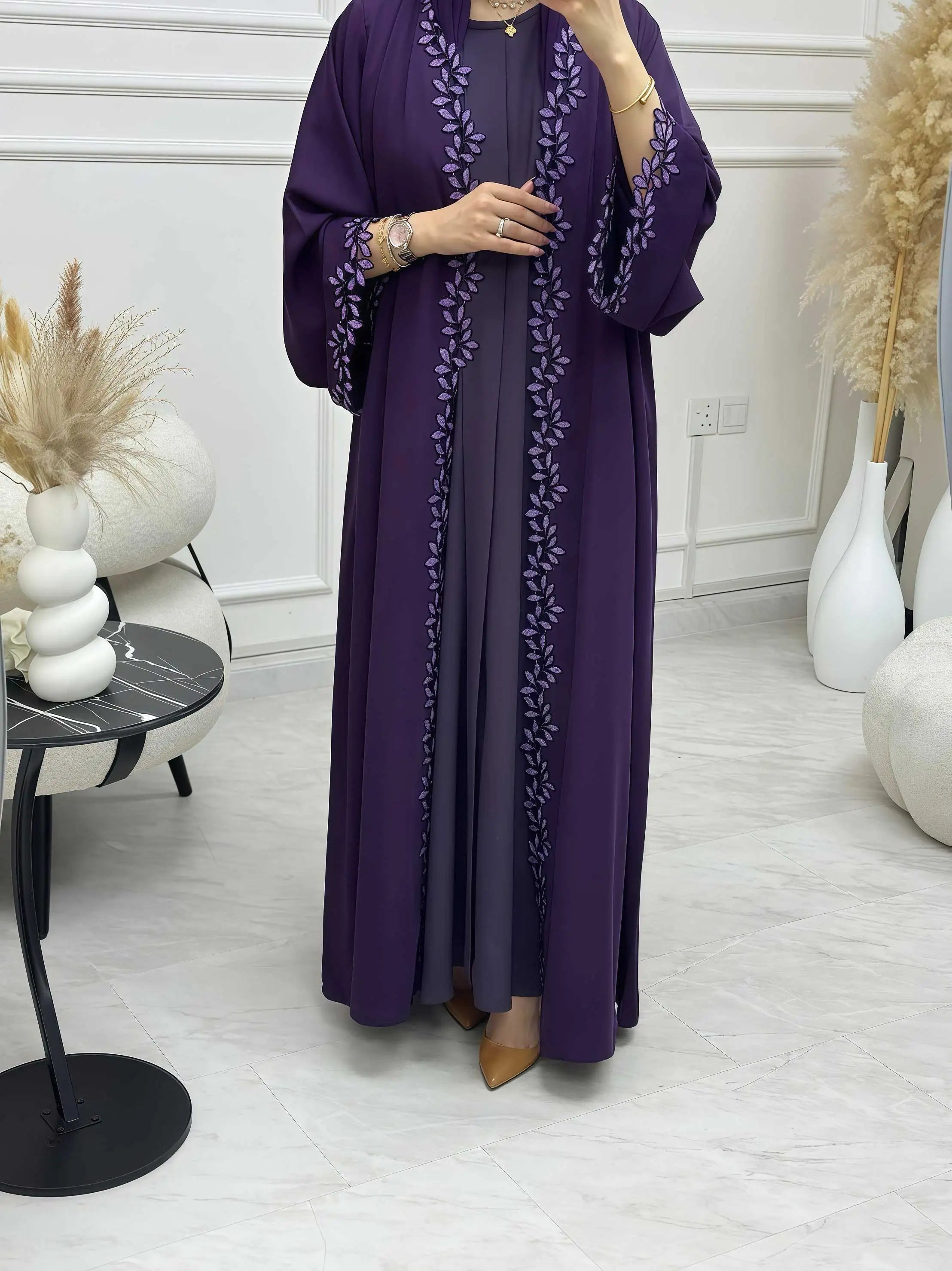 Elegant beige abaya from Dubai for Muslim women – Designed with a piece of multicolored embroidery in modest Islamic fashion