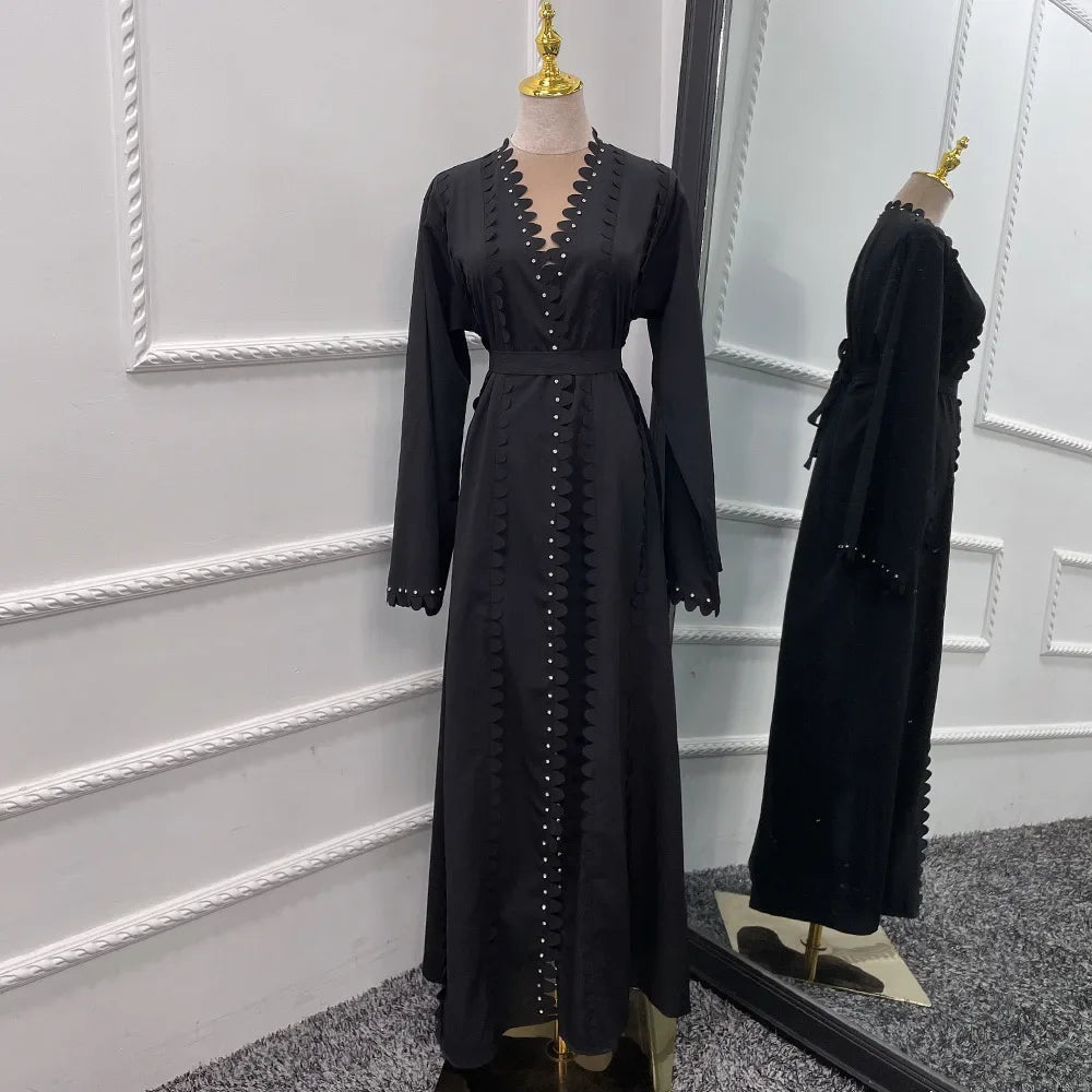 Cardigan perlé fait main, jupe longue élégante