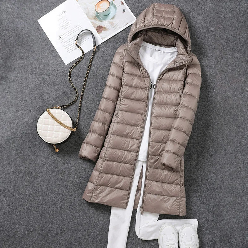 Femme printemps rembourré à capuche longue veste blanc canard vers le bas femme pardessus Ultra léger mince solide vestes manteau Portable Parkas