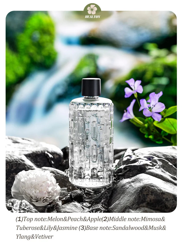 Diffuseur d'aromathérapie automatique pour éliminer les odeurs, adapté à un usage domestique, avec de l'huile essentielle pour le rafraîchissement de l'air.