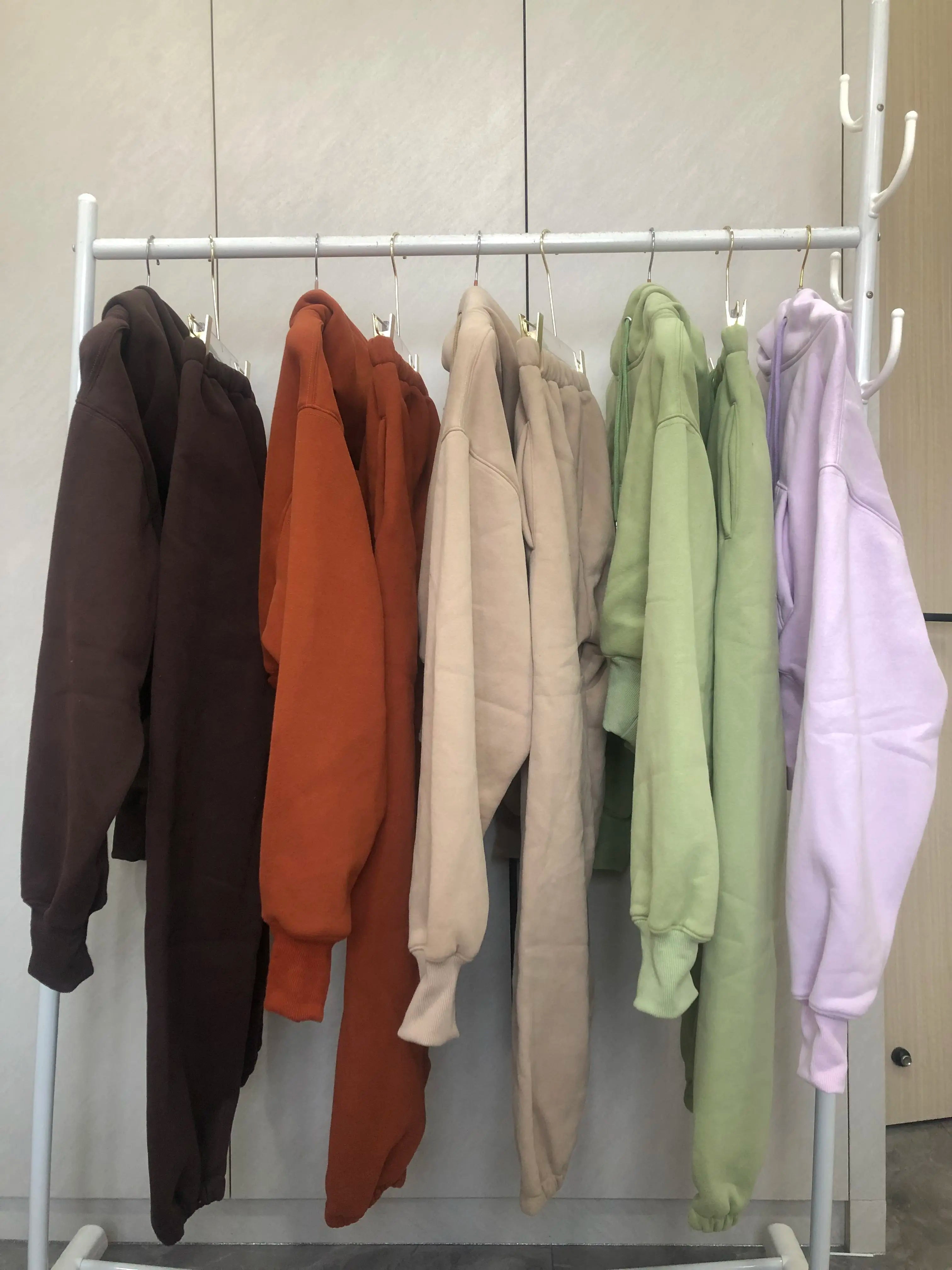 Sweat à capuche Smile avec pantalon de jogging pour femme, ensemble 2 pièces, tenue de sport décontractée, survêtement monochrome, imbibé de sueur, vente en gros, automne et hiver