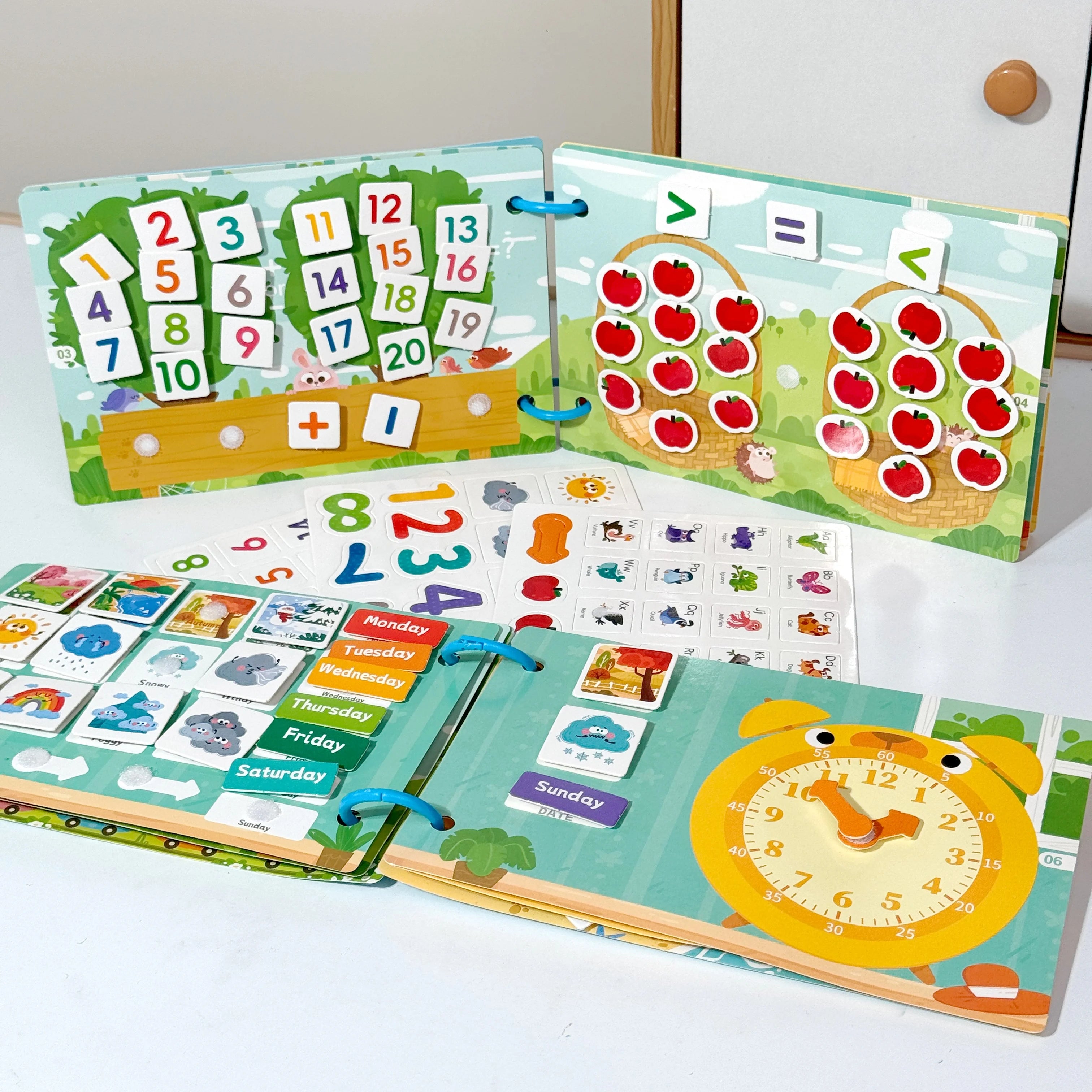 Livre silencieux de l'heure météo, jouets interactifs d'éveil éducatif pour enfants, comprenant la cognition météo, l'apprentissage des dates, les opérations numériques, la correspondance des formes et autres thèmes,