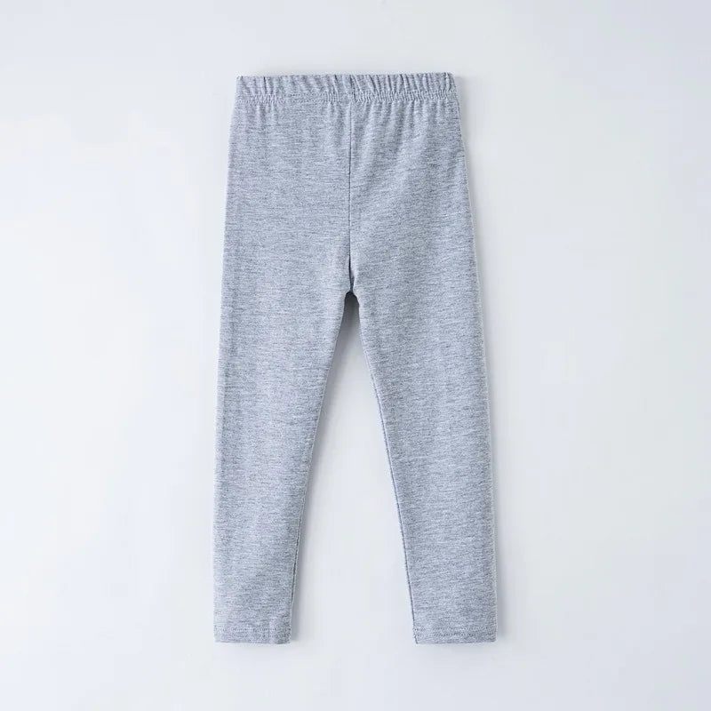 Girls' leggings for spring and summer, suitable for outdoor wear. They are slim-fitting, long pants for children.