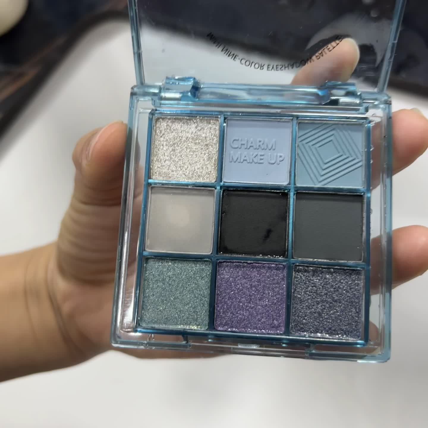 Mesmerizing Blue Sky 9-Color Eyeshadow Palette - Shimmer, Glitter & Matte Finishes - Waterproof, Sweatproof, Long-Lasting - Perfect for Smoky Grey & Blue Makeup Looks
